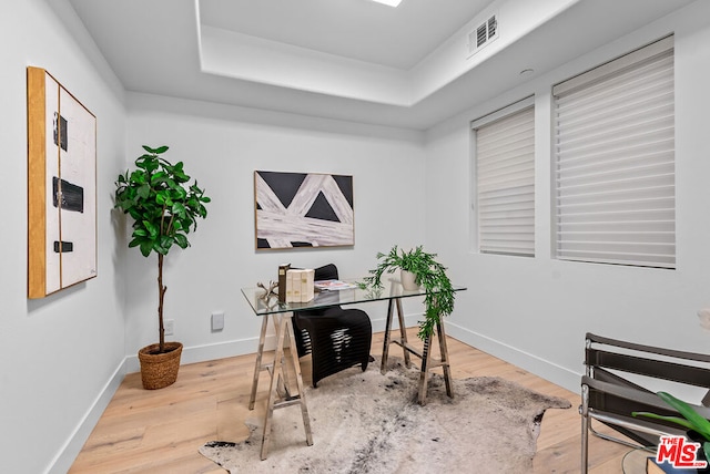 home office featuring light hardwood / wood-style floors