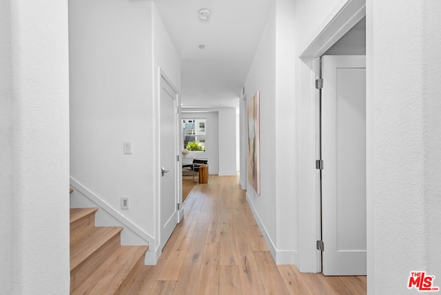 corridor featuring light wood-type flooring