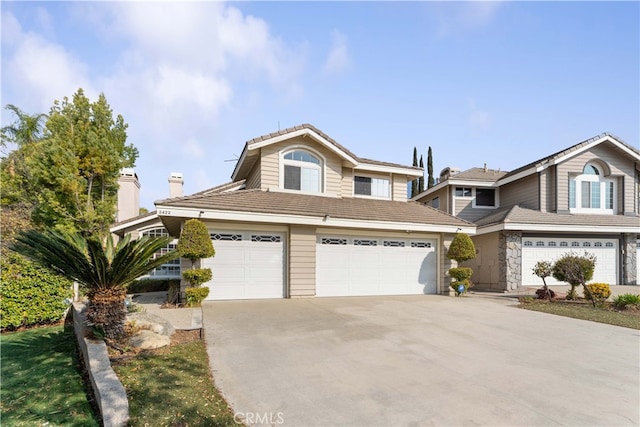 front of property featuring a garage