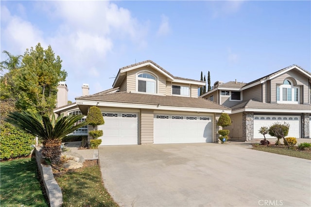 view of front of property with stone siding, a tile roof, and driveway