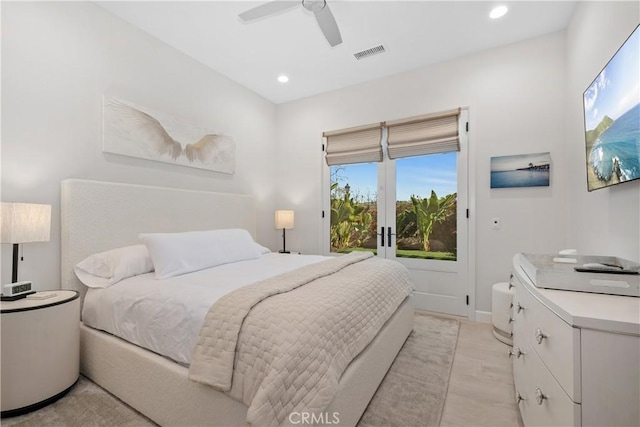 bedroom featuring ceiling fan and light wood-type flooring