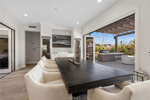 dining room with light hardwood / wood-style floors