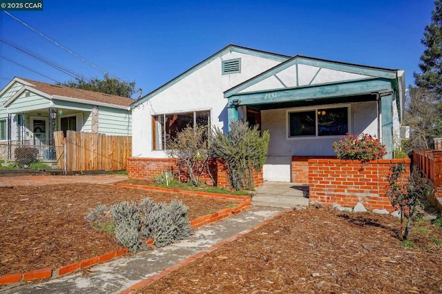 bungalow-style home featuring covered porch