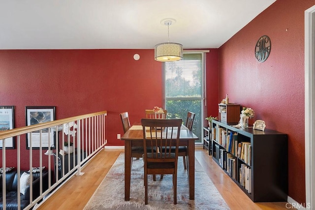 dining area featuring hardwood / wood-style floors