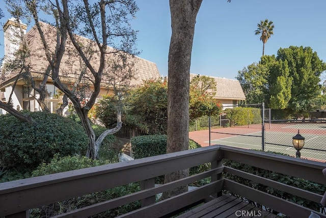 exterior space featuring tennis court