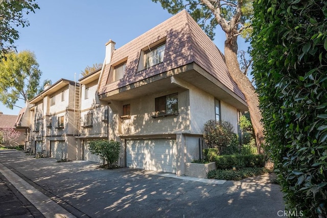 view of property with a garage