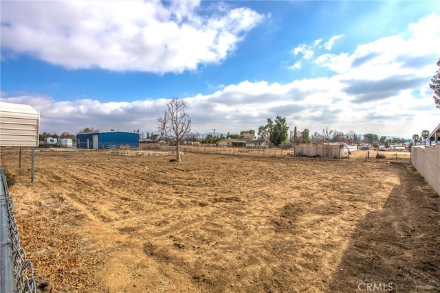 view of yard featuring a rural view