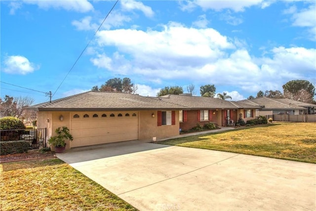 ranch-style house with a garage and a front yard