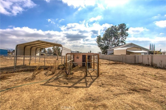 view of yard featuring a carport