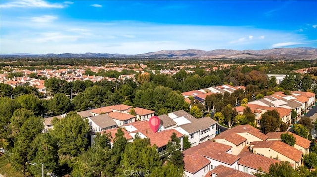 birds eye view of property with a residential view and a mountain view