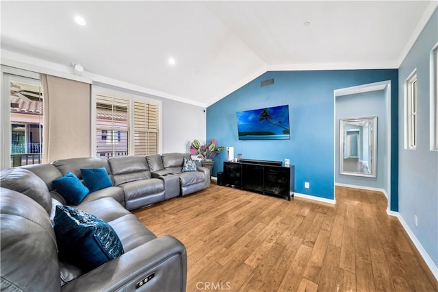 living area featuring visible vents, wood finished floors, recessed lighting, baseboards, and lofted ceiling