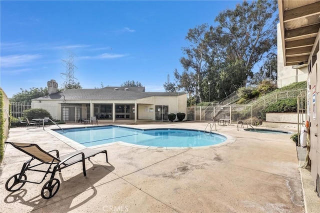 view of pool featuring a patio