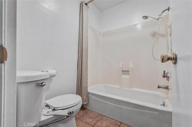 bathroom with tile patterned flooring, shower / bathtub combination with curtain, and toilet