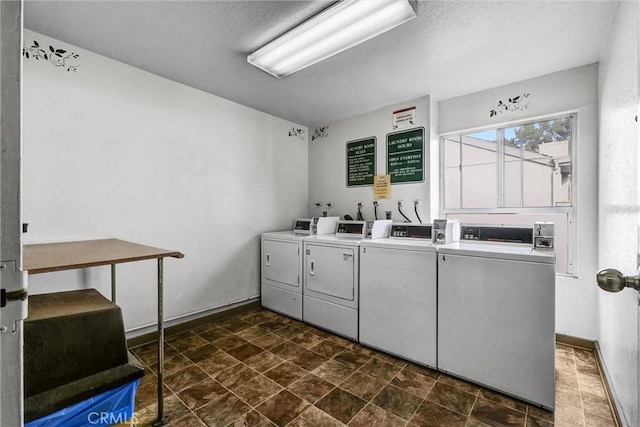 laundry room with washer and dryer