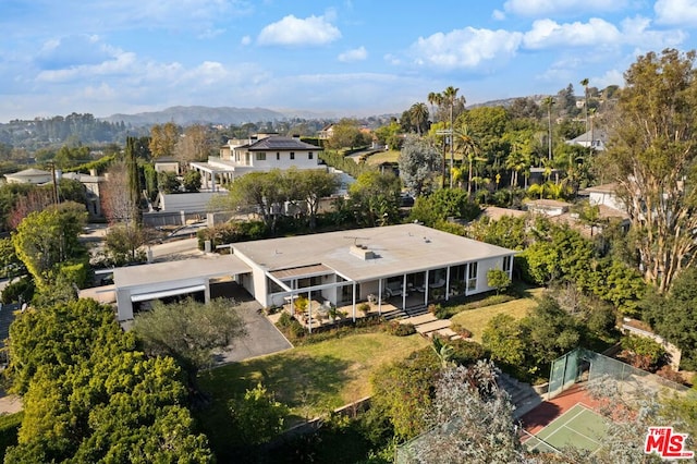 drone / aerial view featuring a mountain view