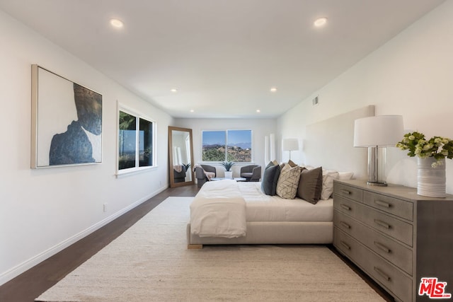 bedroom featuring hardwood / wood-style floors