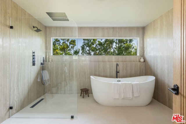 bathroom with independent shower and bath