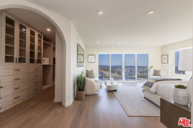 bedroom featuring hardwood / wood-style flooring