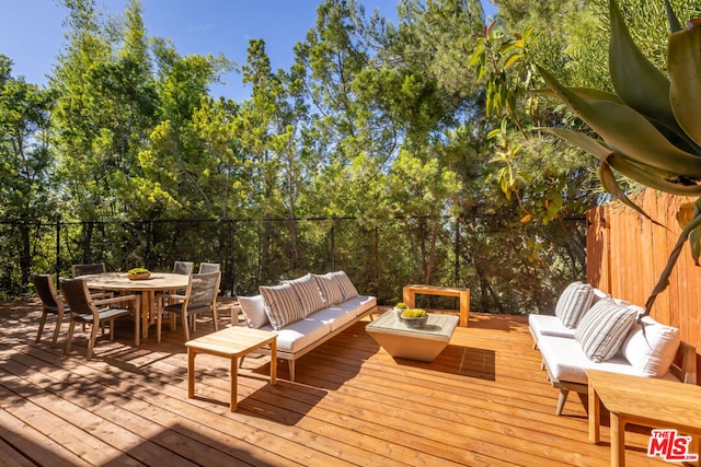 deck with an outdoor living space