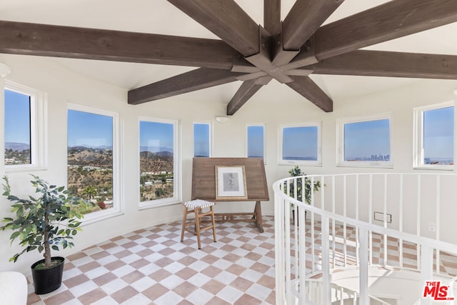 sunroom / solarium with beam ceiling