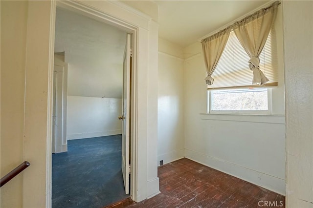 bonus room featuring dark hardwood / wood-style floors