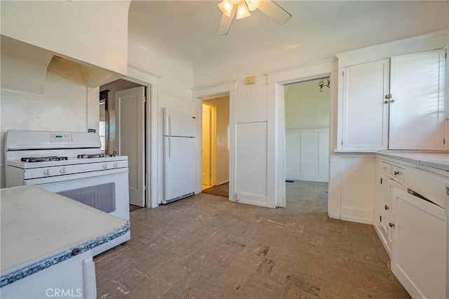 kitchen with white cabinetry, white appliances, and ceiling fan