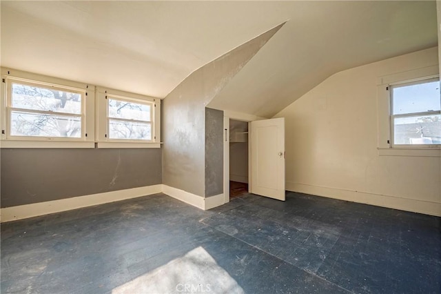 bonus room with vaulted ceiling