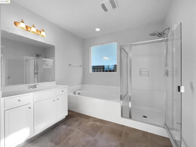 bathroom featuring vanity, separate shower and tub, and tile patterned flooring