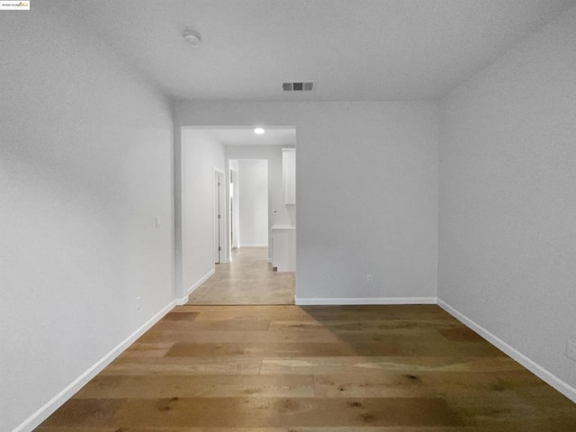 interior space with hardwood / wood-style flooring