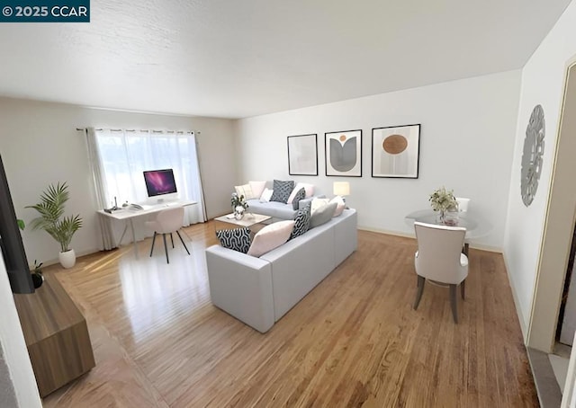 living room with light hardwood / wood-style floors