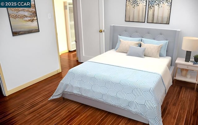 bedroom featuring wood-type flooring