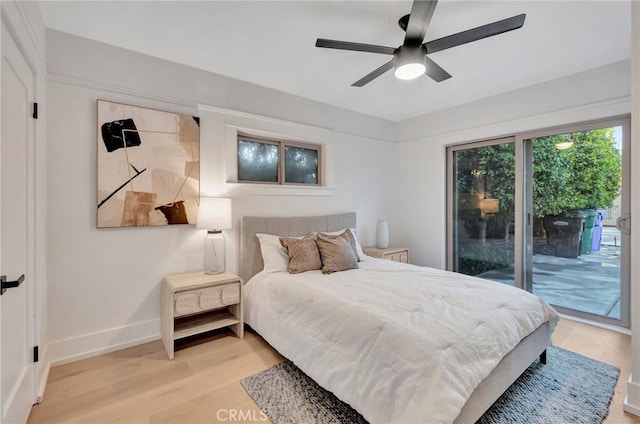 bedroom with ceiling fan, access to exterior, and light hardwood / wood-style floors