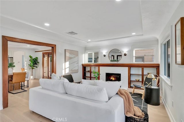 living room with light hardwood / wood-style floors