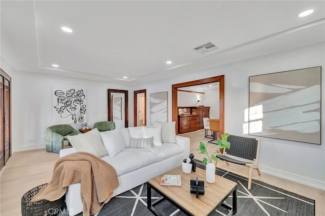 living room with light hardwood / wood-style floors