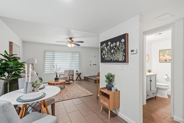 living room with ceiling fan