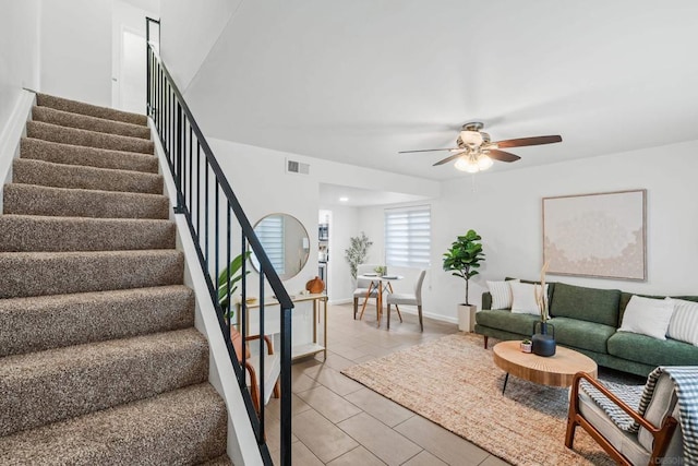 living room with ceiling fan