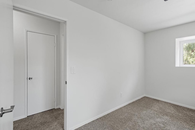 unfurnished room with carpet