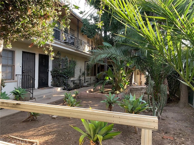 exterior space with a balcony