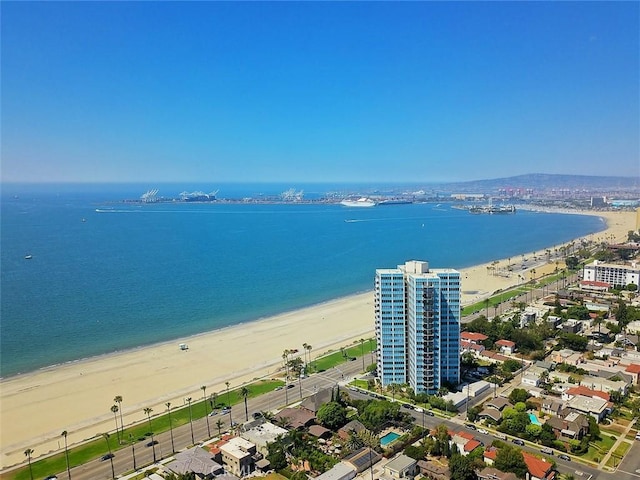 aerial view featuring a view of the beach, a view of city, and a water view