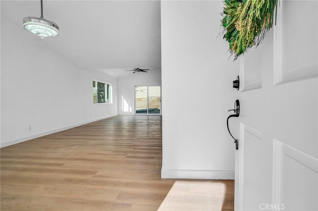 foyer entrance featuring light hardwood / wood-style flooring and ceiling fan