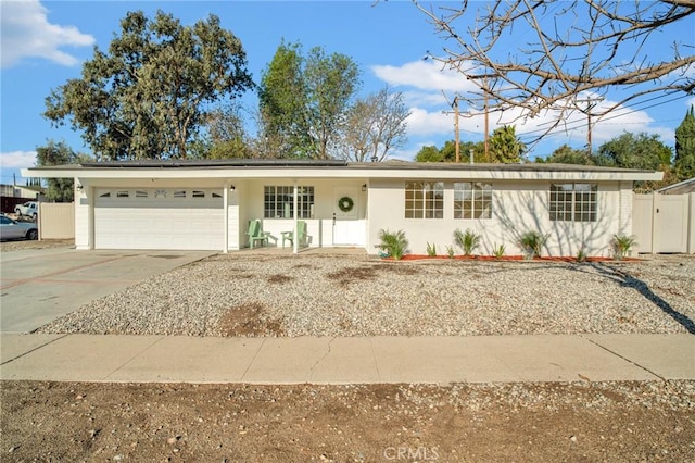 single story home featuring a garage