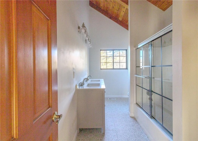 full bathroom with combined bath / shower with glass door, vaulted ceiling with beams, vanity, toilet, and wooden ceiling