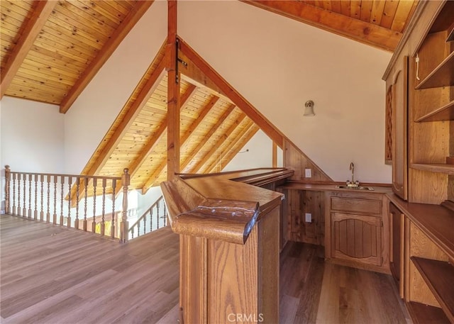 interior space featuring sink, wood ceiling, and dark wood-type flooring