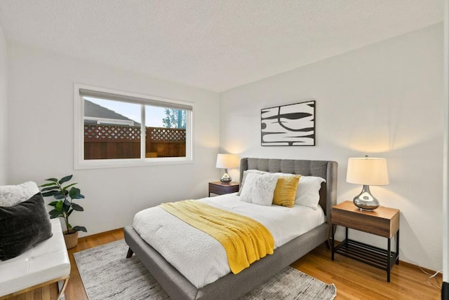 bedroom featuring hardwood / wood-style floors