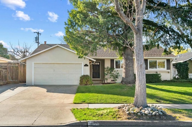 ranch-style house featuring a garage and a front yard