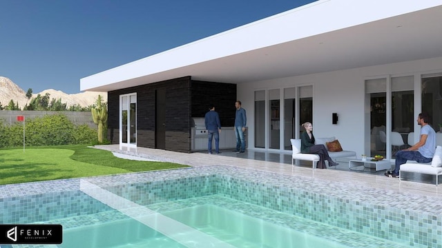 view of pool with a mountain view, a lawn, and a patio