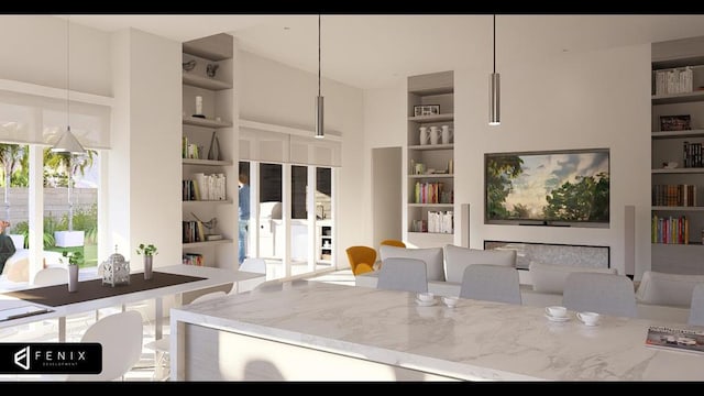 dining area with built in shelves and a towering ceiling