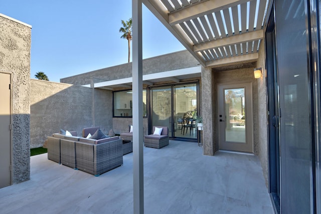 view of patio featuring a pergola and outdoor lounge area