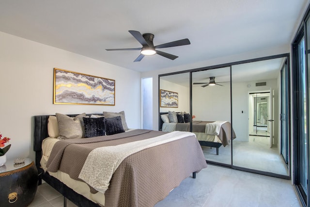 bedroom featuring ceiling fan and a closet