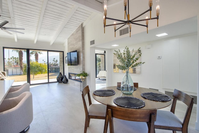 dining area with a healthy amount of sunlight, beam ceiling, high vaulted ceiling, and wooden ceiling